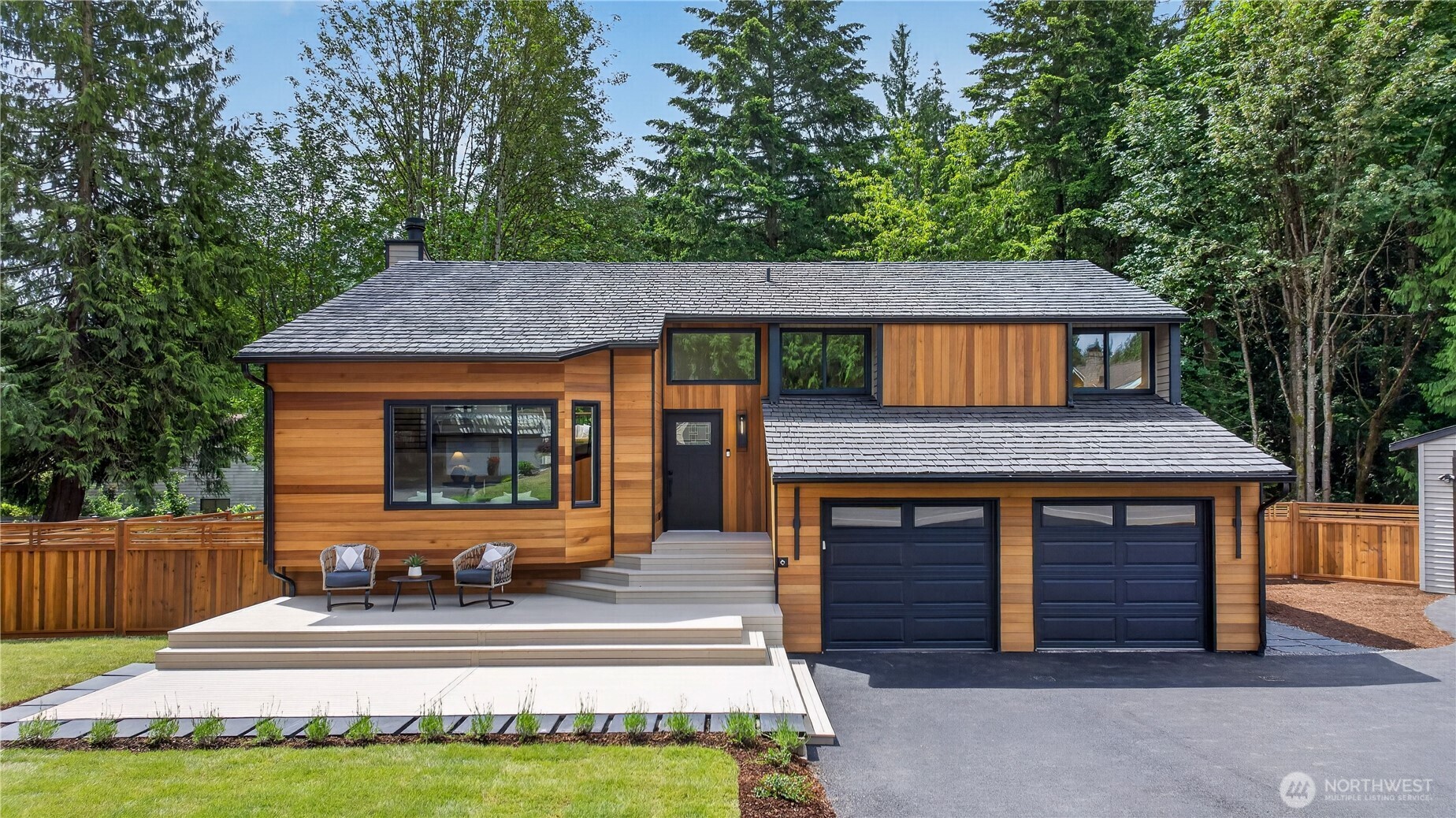 The new front deck creates a warm and welcoming place to sit, relax, and enjoy the neighborhood. The new front lawn and young plantings add a fresh, finished touch. It is the perfect spot to say hello as neighbors stroll by and feel connected to the English Hill community.