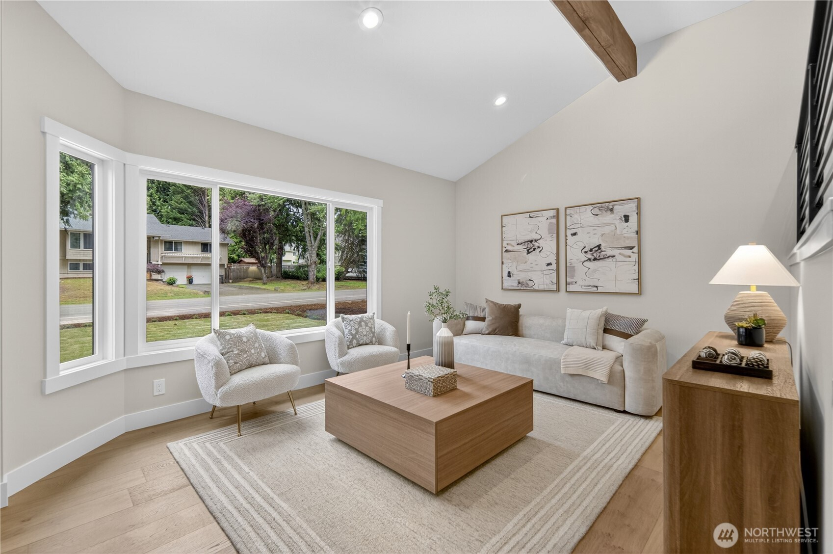 The upper floor opens beautifully for everyday togetherness, with the living, dining, and kitchen areas flowing easily from one space to the next. Large south-facing windows bring in natural light, giving the main living areas a bright, comfortable feel throughout the day.