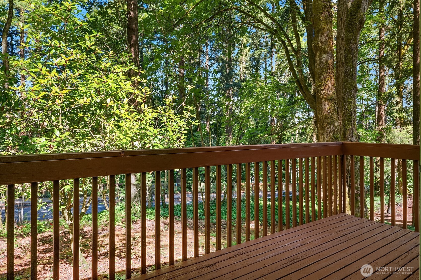 Private deck off living room.