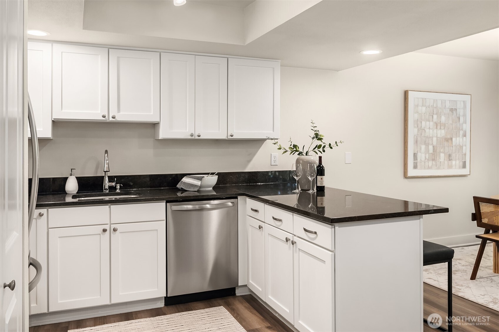Bright kitchen w/ granite counters.