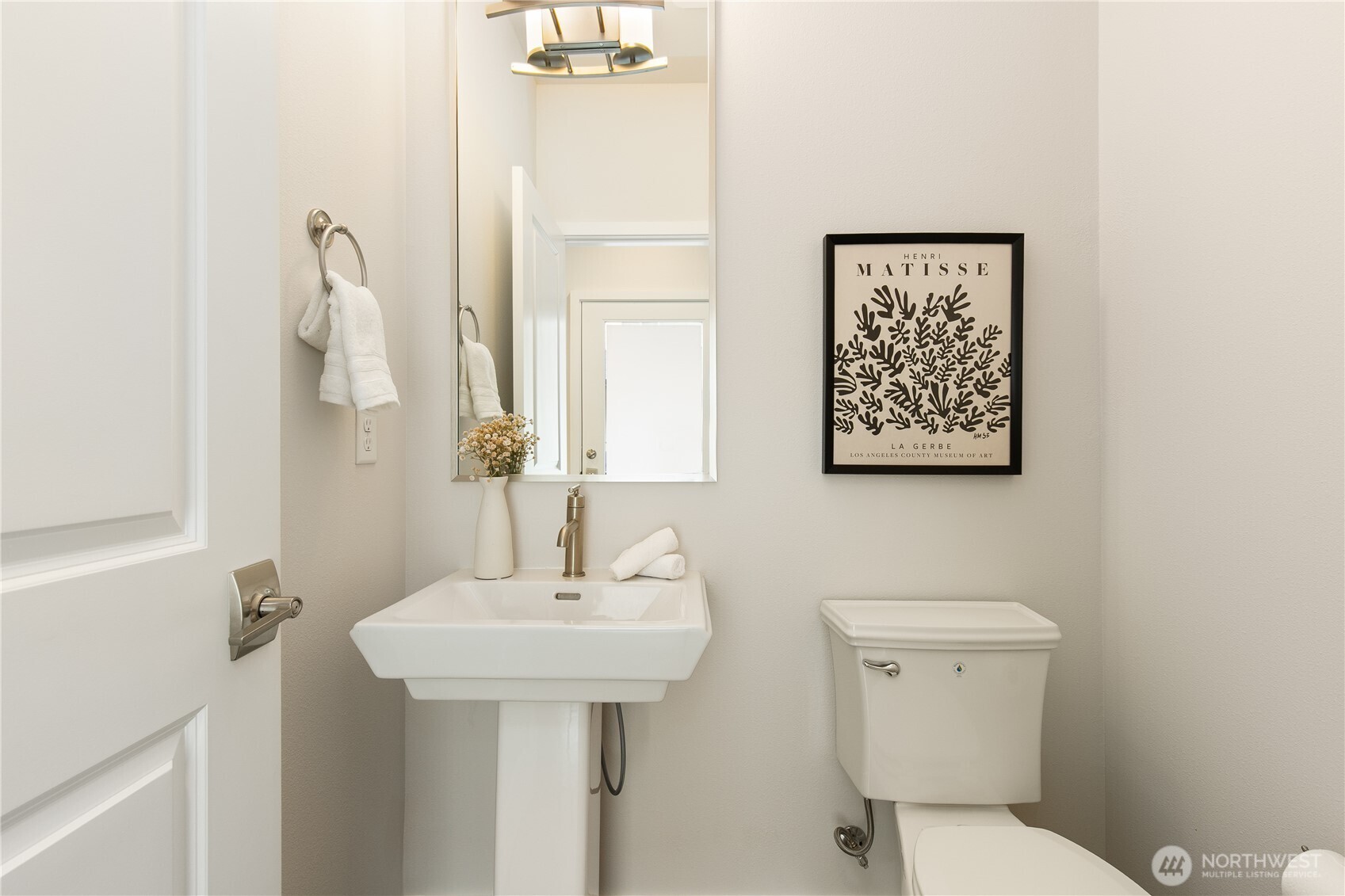 Convenient guest  powder room on main level