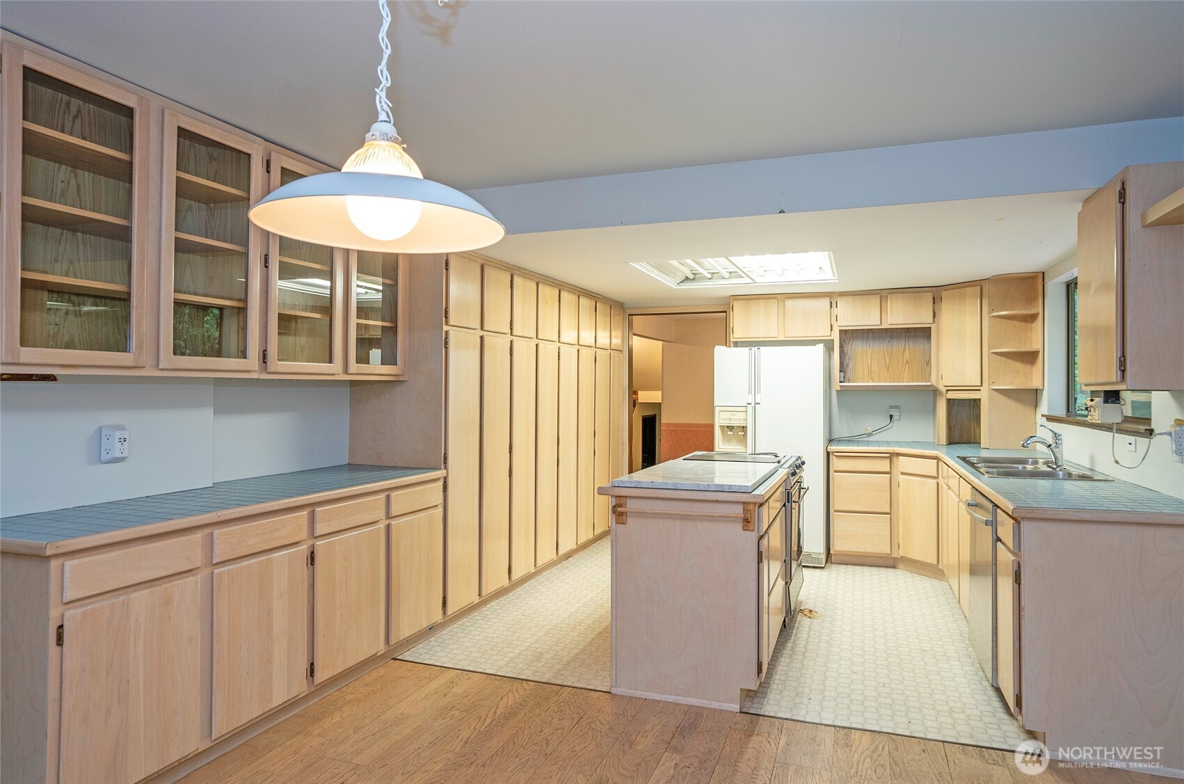 Kitchen features an impressive amount of cabinet space and abundant storage throughout.