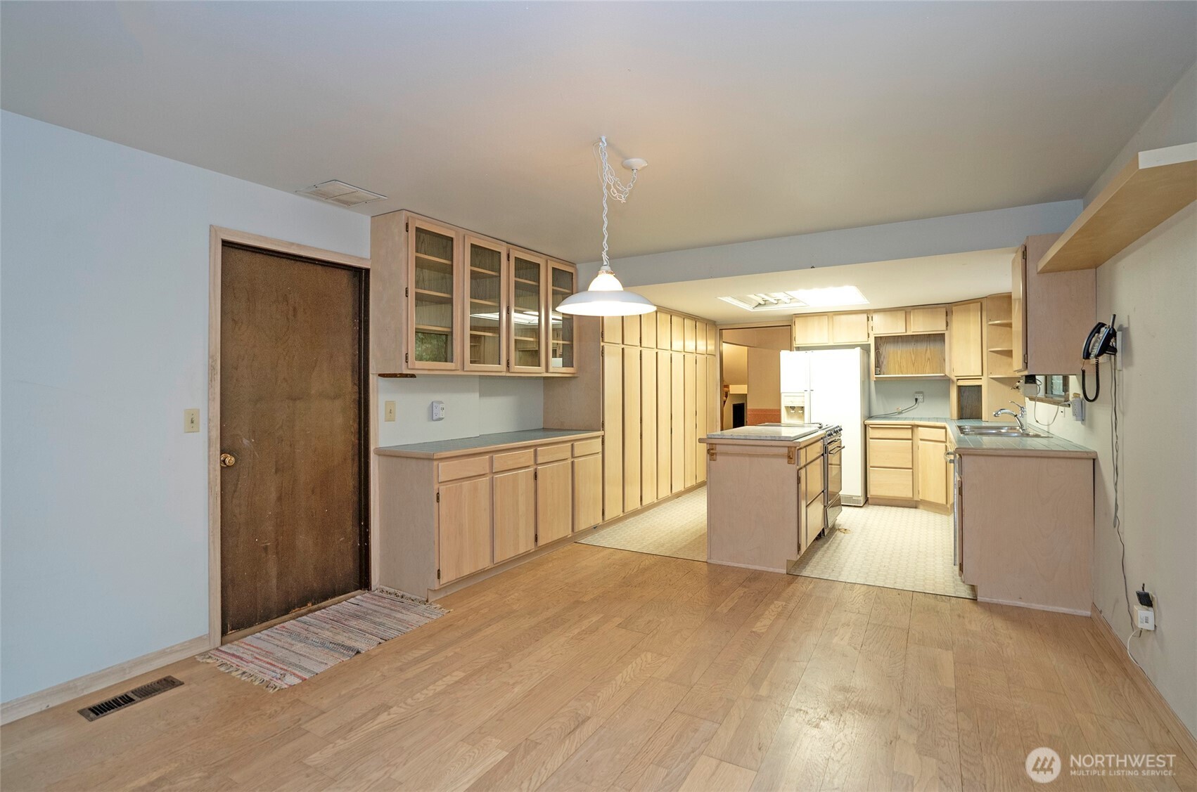 Family room offers a great open view into the kitchen and adjoining eating space.