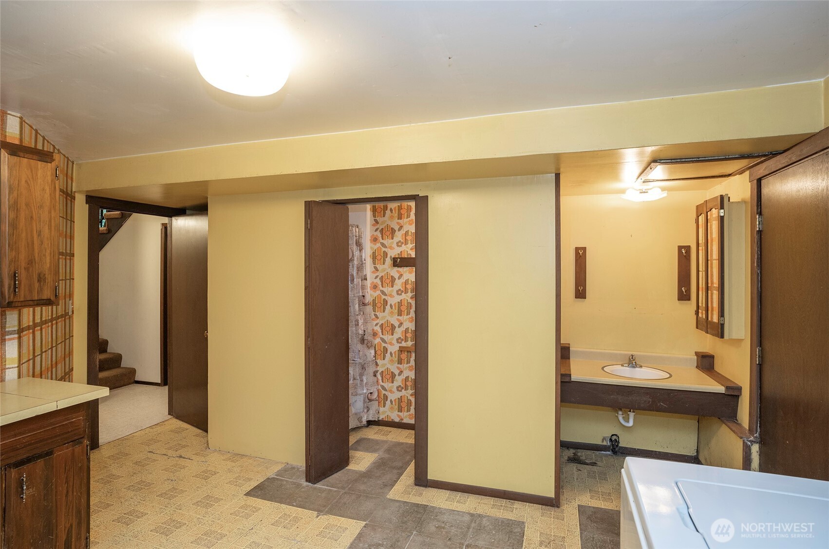 Convenient private ¾ bath located off the lower-level utility room.