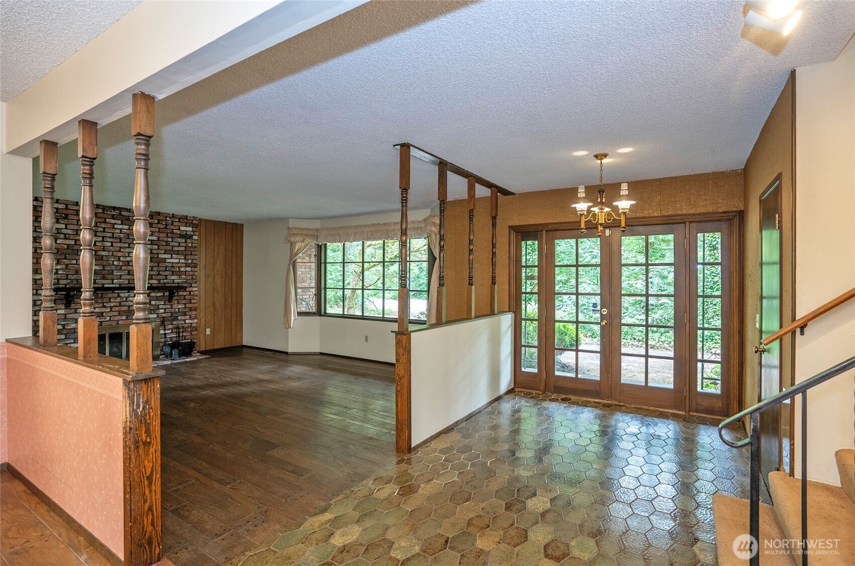 Inviting view of the entry and living areas—imagine what you could create here.