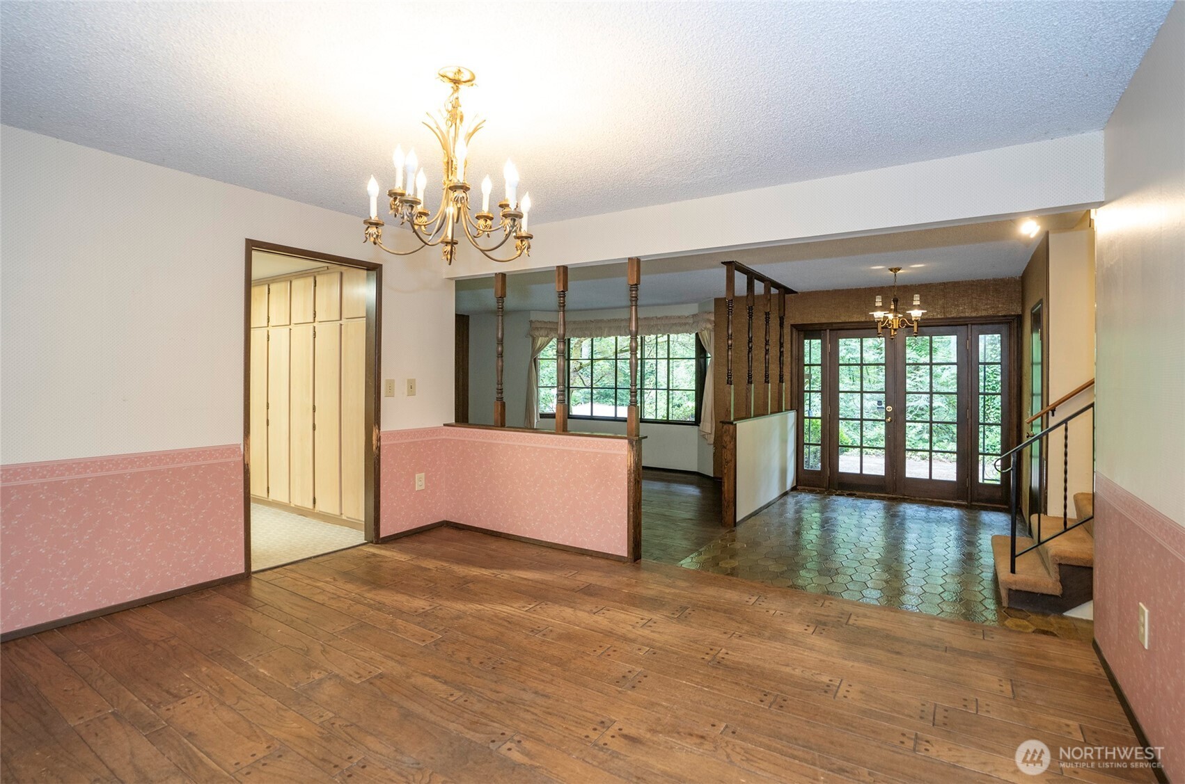 Additional angle of the entry and living area from the dining room.