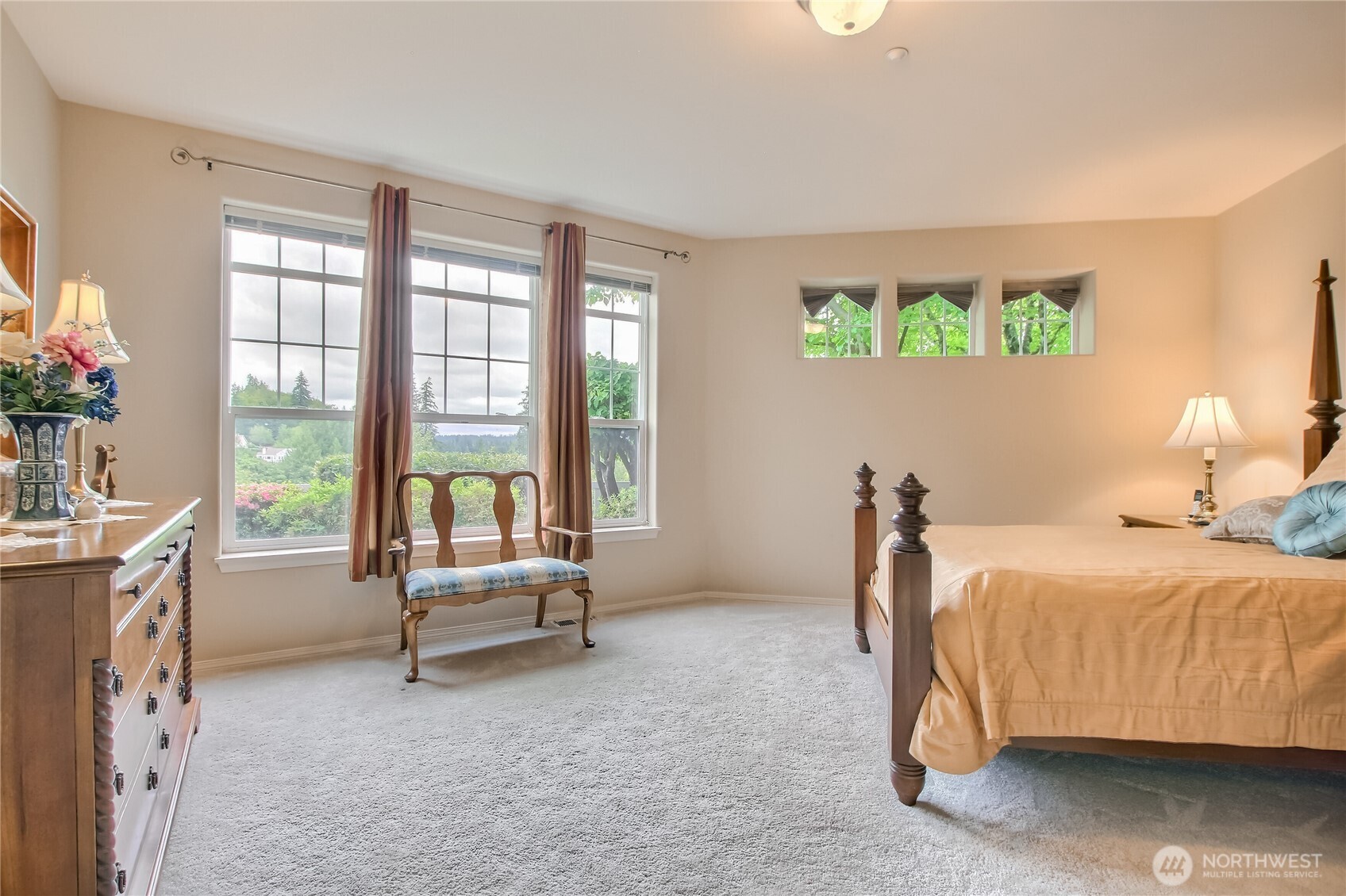 Spacious second bedroom with walk in closet and view windows