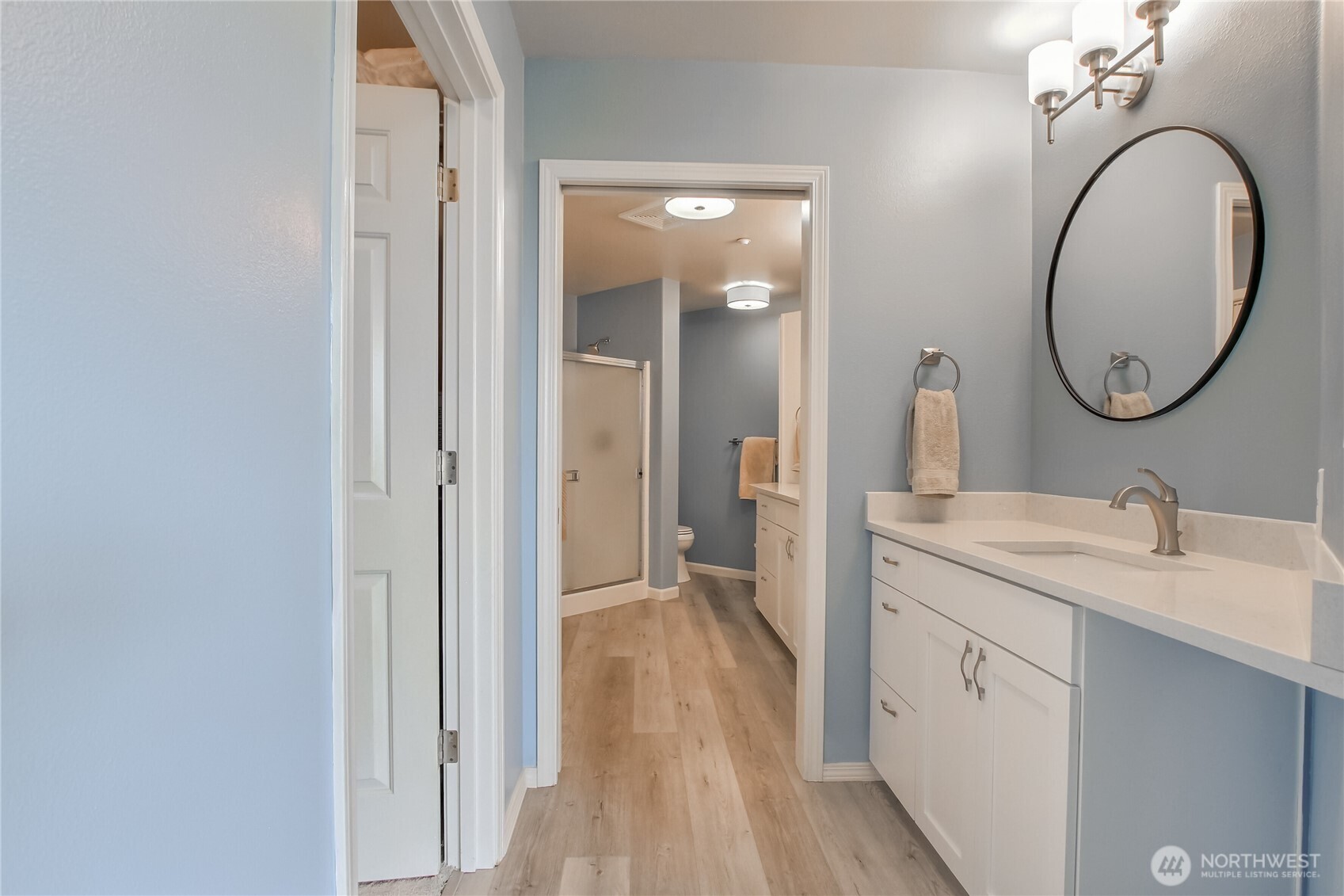 Updated ensuite with plank floors and walk in closet