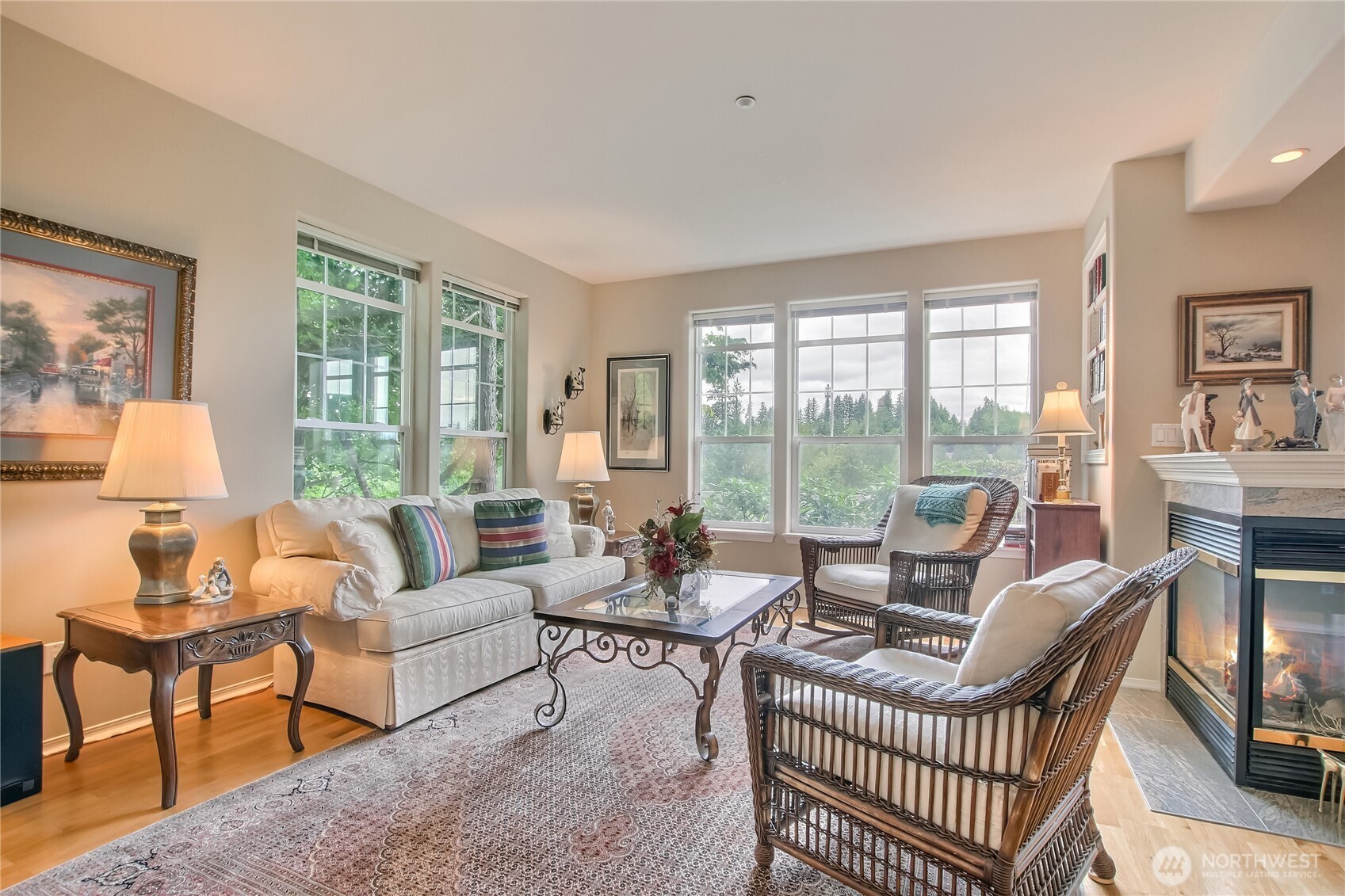 Living room with view windows and fireplace