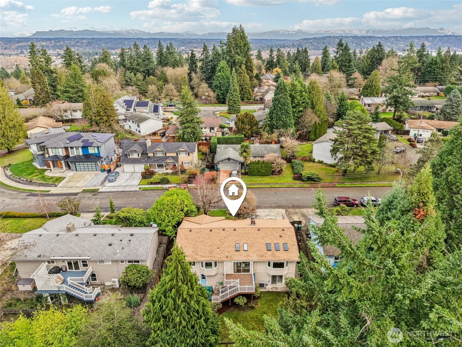 Tucked on a quiet, tree-lined street just moments from Microsoft's campus, there's more than meets the eye in this mid-century gem!