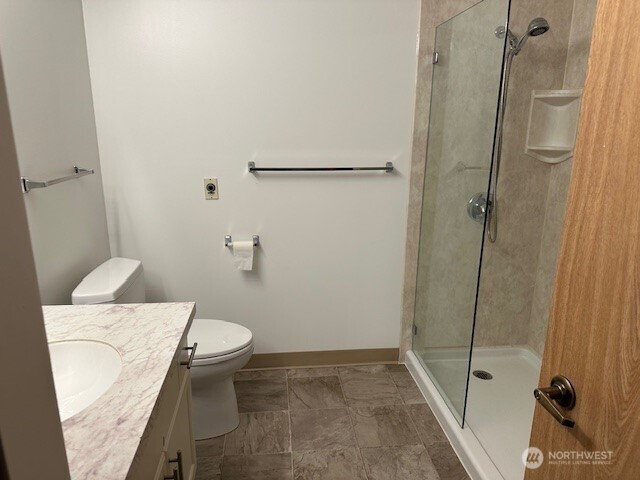 large walk in closet with safety bar