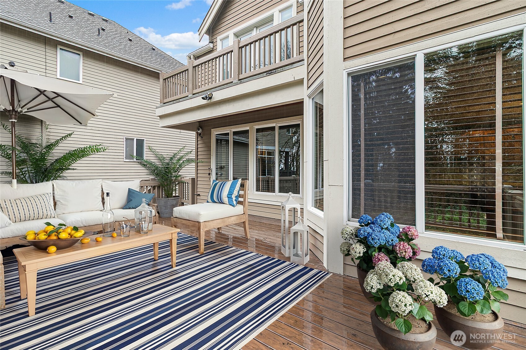 Casual dining in the kitchen nook overlooking the backyard and has access to the deck.