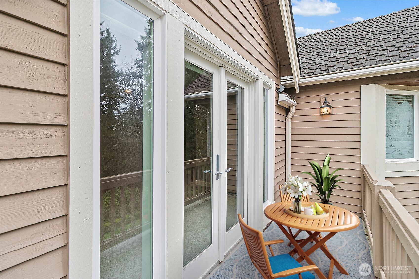 French door entry and balcony off the Primary.