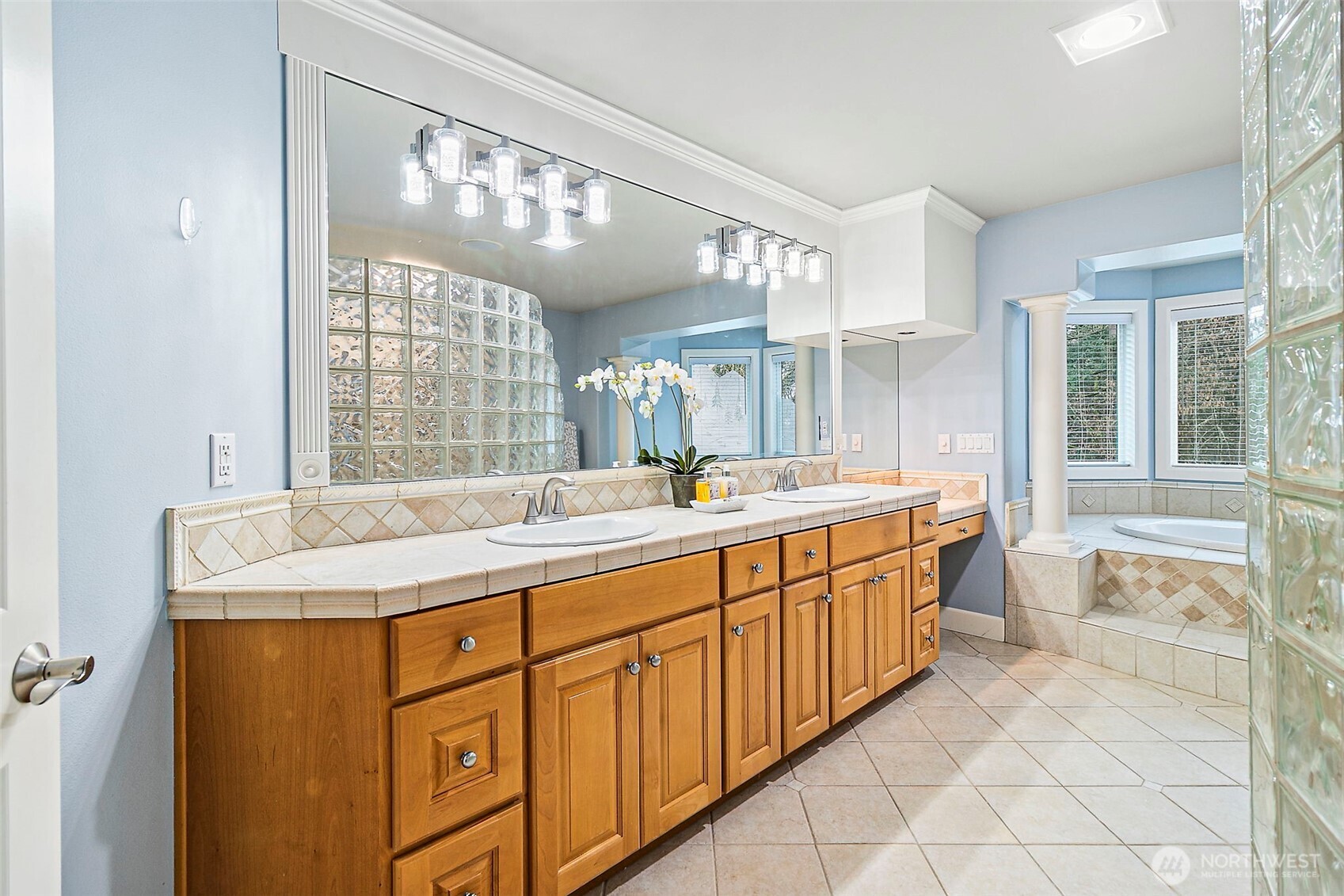 Continuing the grand style into the Primary bath.