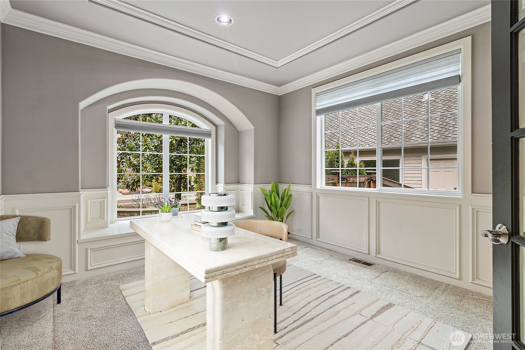 Grand foyer leads in many directions and features the open rail balcony on the 2nd floor.
