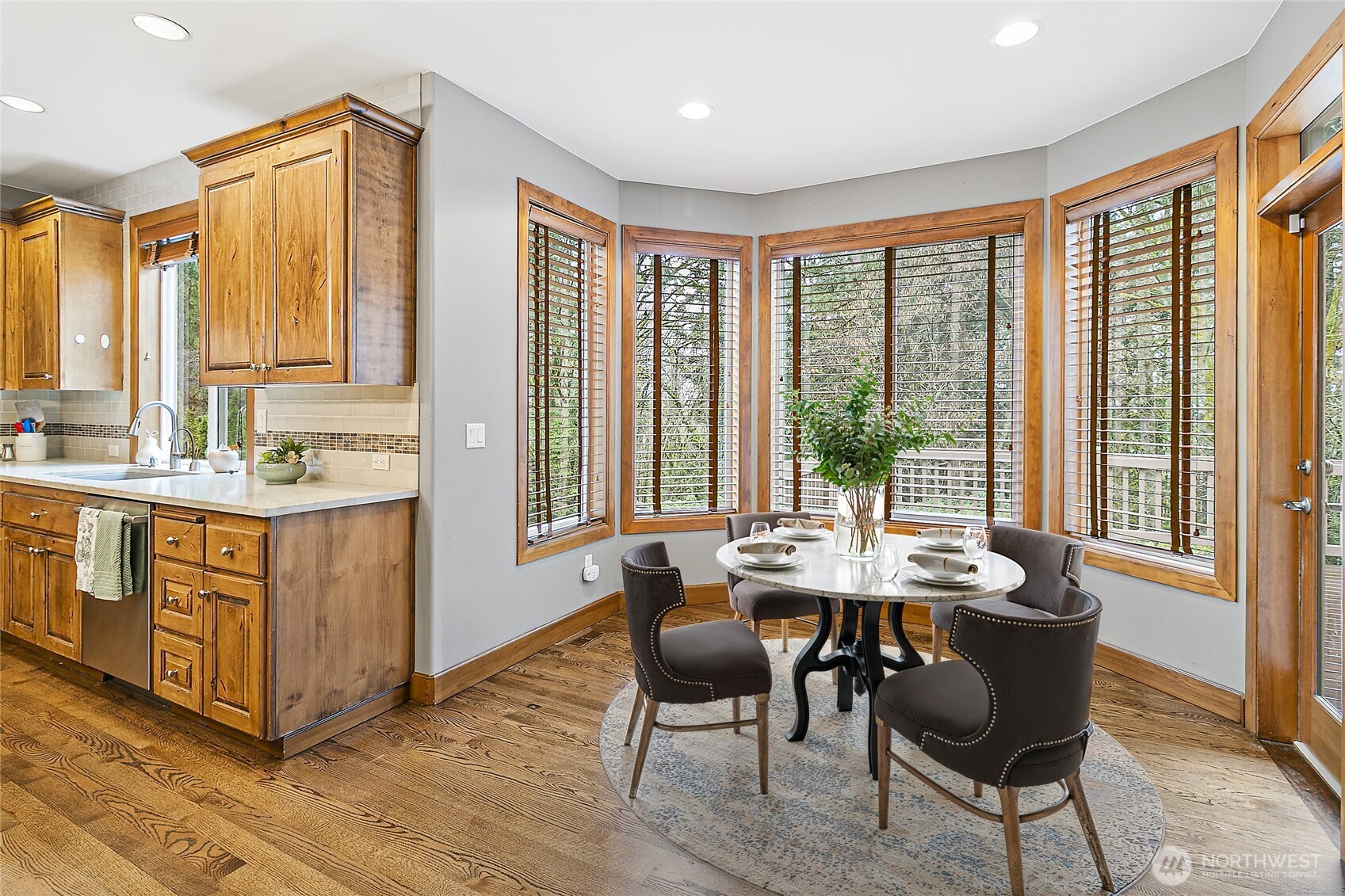 Expansive hardwood floors, many windows and extensive lighting.