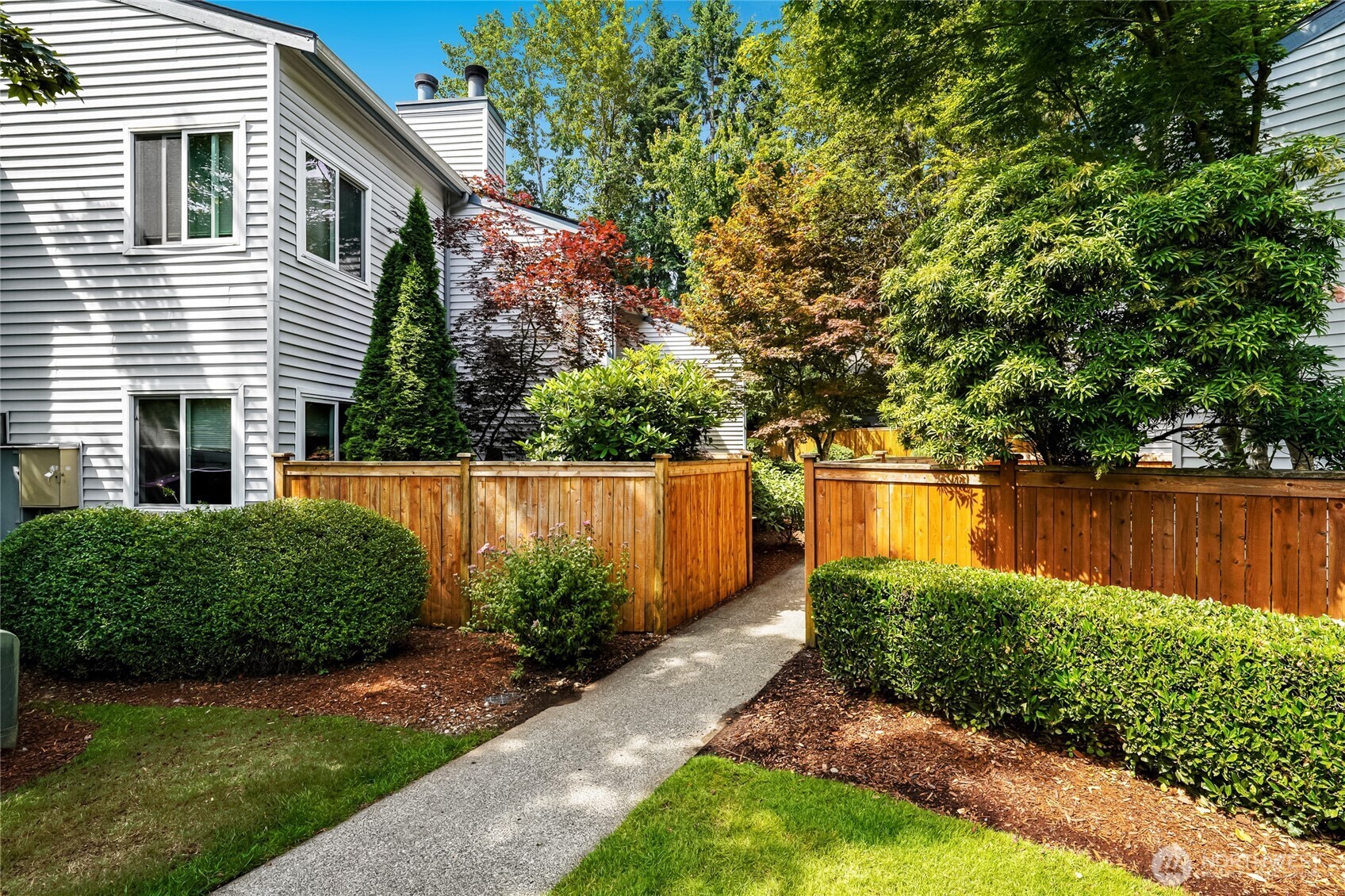 An assigned covered carport is included, with abundant parking available for additional vehicles and guests, which is a convenience increasingly difficult to find in Bellevue.