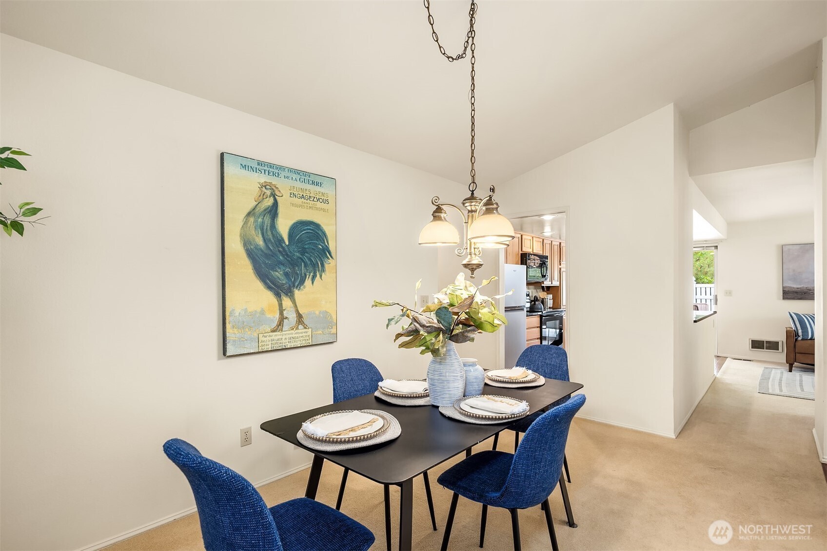 Dining room has convenient access to kitchen and family room.