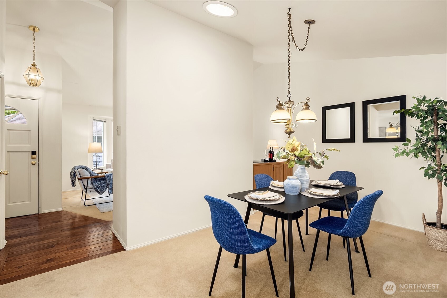 Hardwood floor entry leads to living room and dining room.