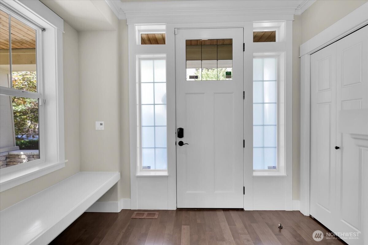 Entry has Build in Bench for sitting or decor items