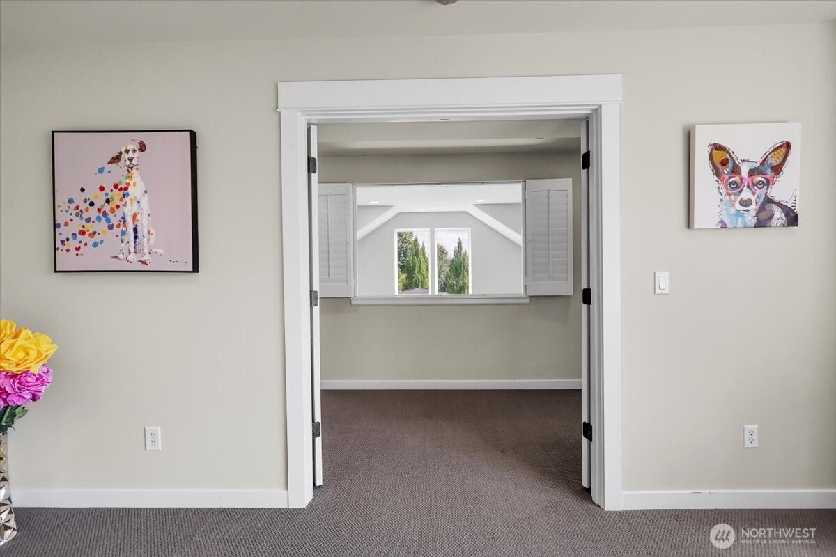 French Doors lead to the Primary Suite