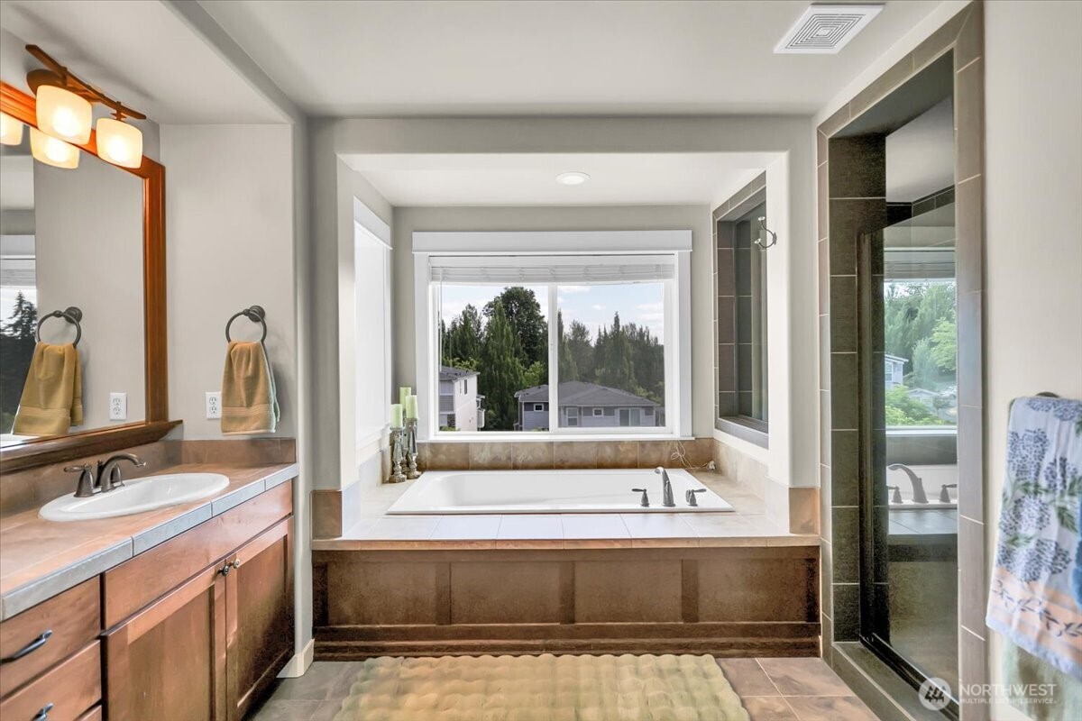 Primary Bath Soaking Tub and large Glass Shower enterence