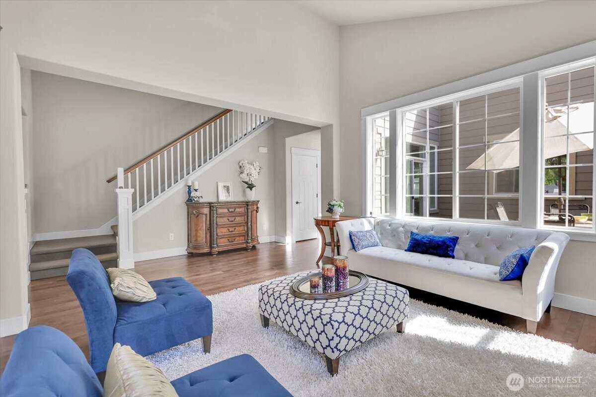 Living Room with view of the stairwell to 2nd floor