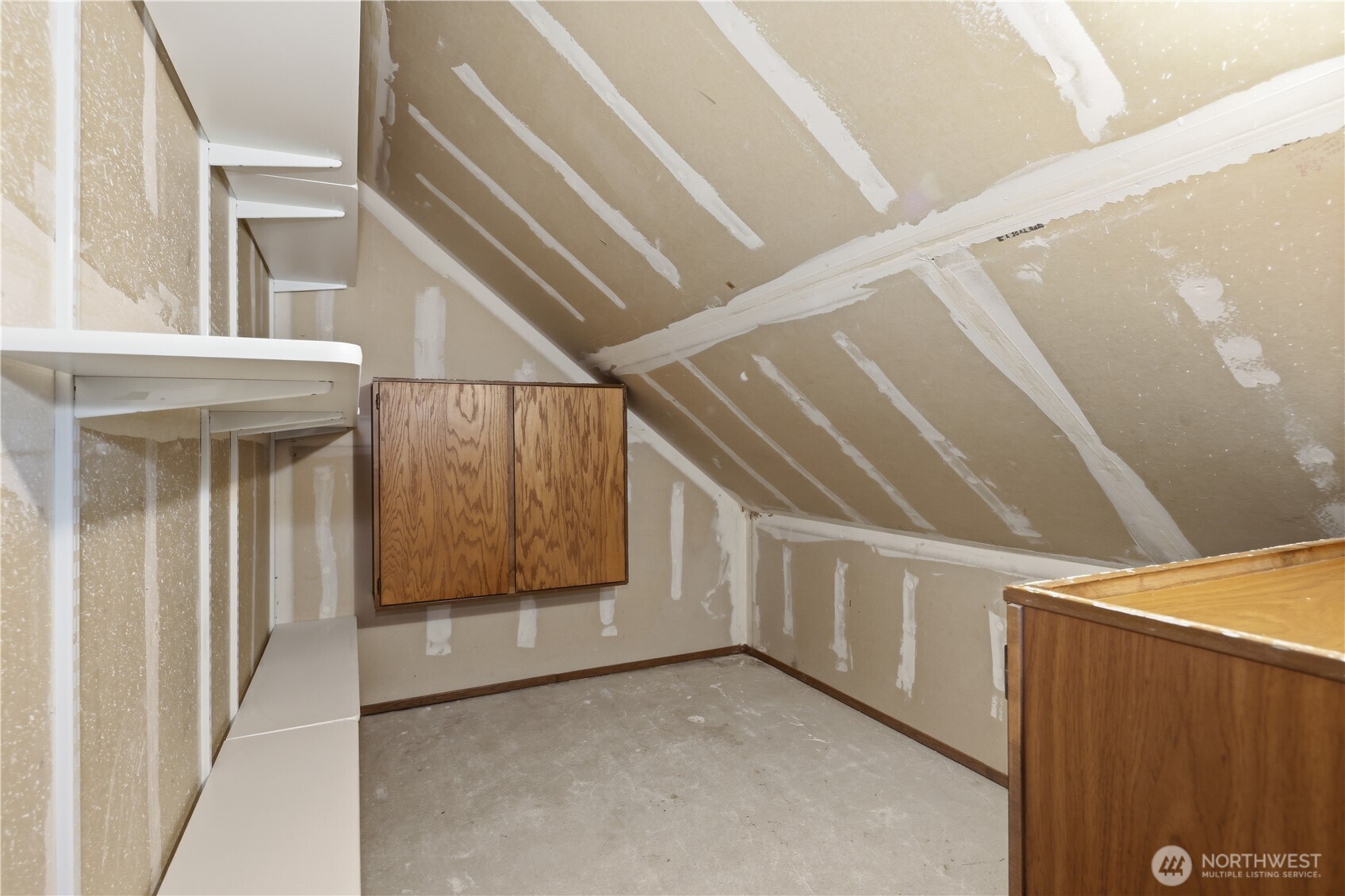 Large shelved storage room upstairs
