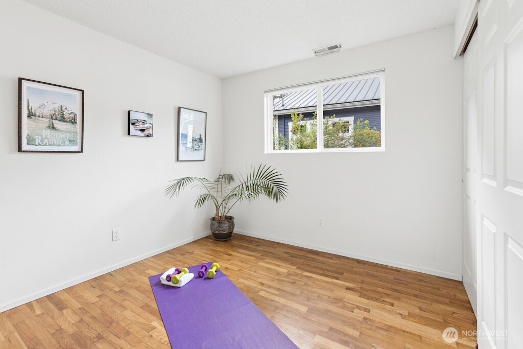 3rd bedroom with oak flooring is freshly painted!