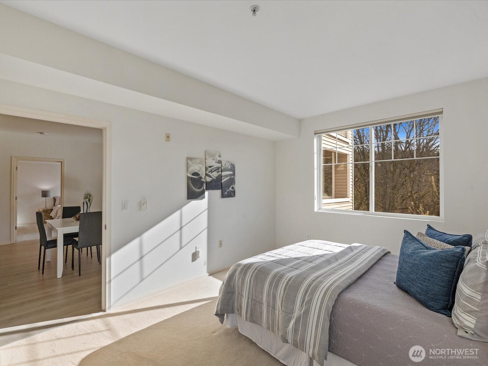 2nd bedroom with natural light and direct connection to main living areas and private ensuite, and walk in closet.