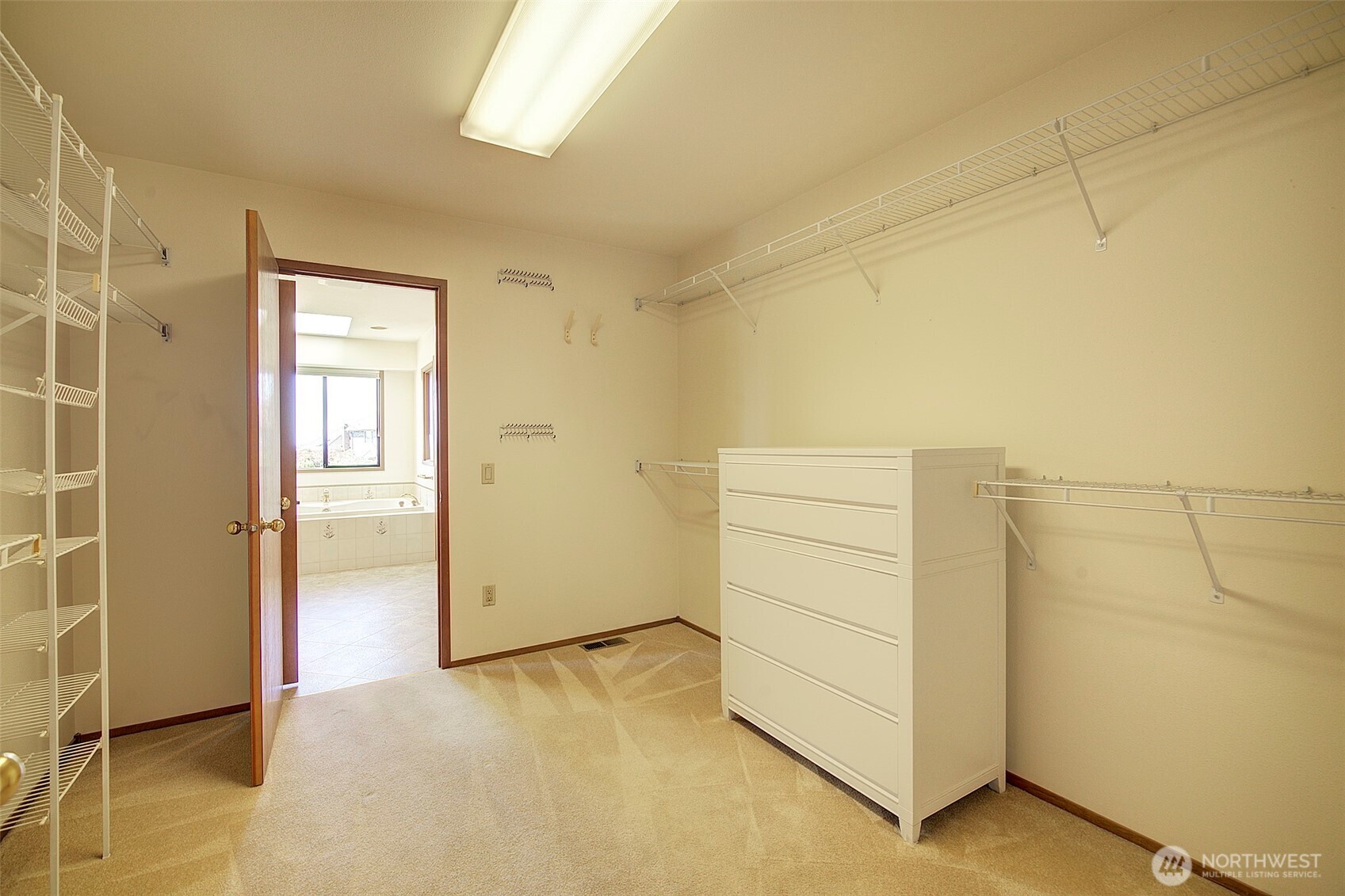 The sitting area in the primary was originally designed as a home office - with views, of course.