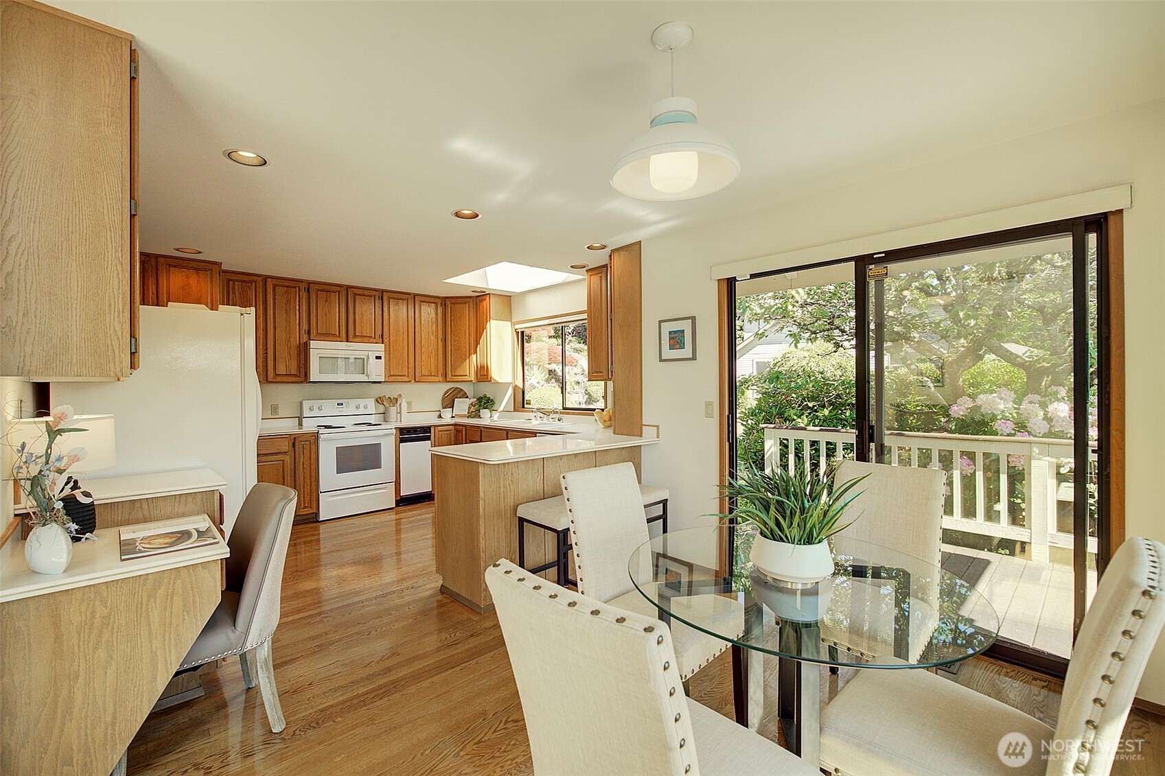 Kitchen dining are with built-in desk.