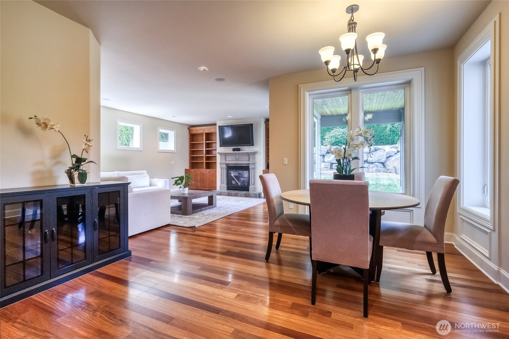 A delightful kitchen nook creates an intimate retreat for casual dining, morning coffee, and enjoying the views.