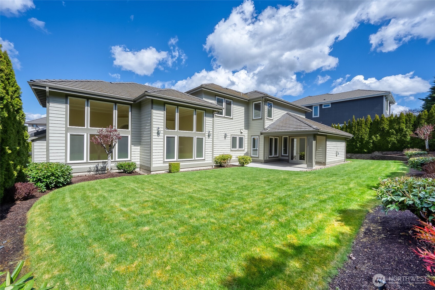 Expansive flat lot with a private backyard oasis, offering a wonderful setting for gatherings, outdoor dining, and leisurely enjoyment.