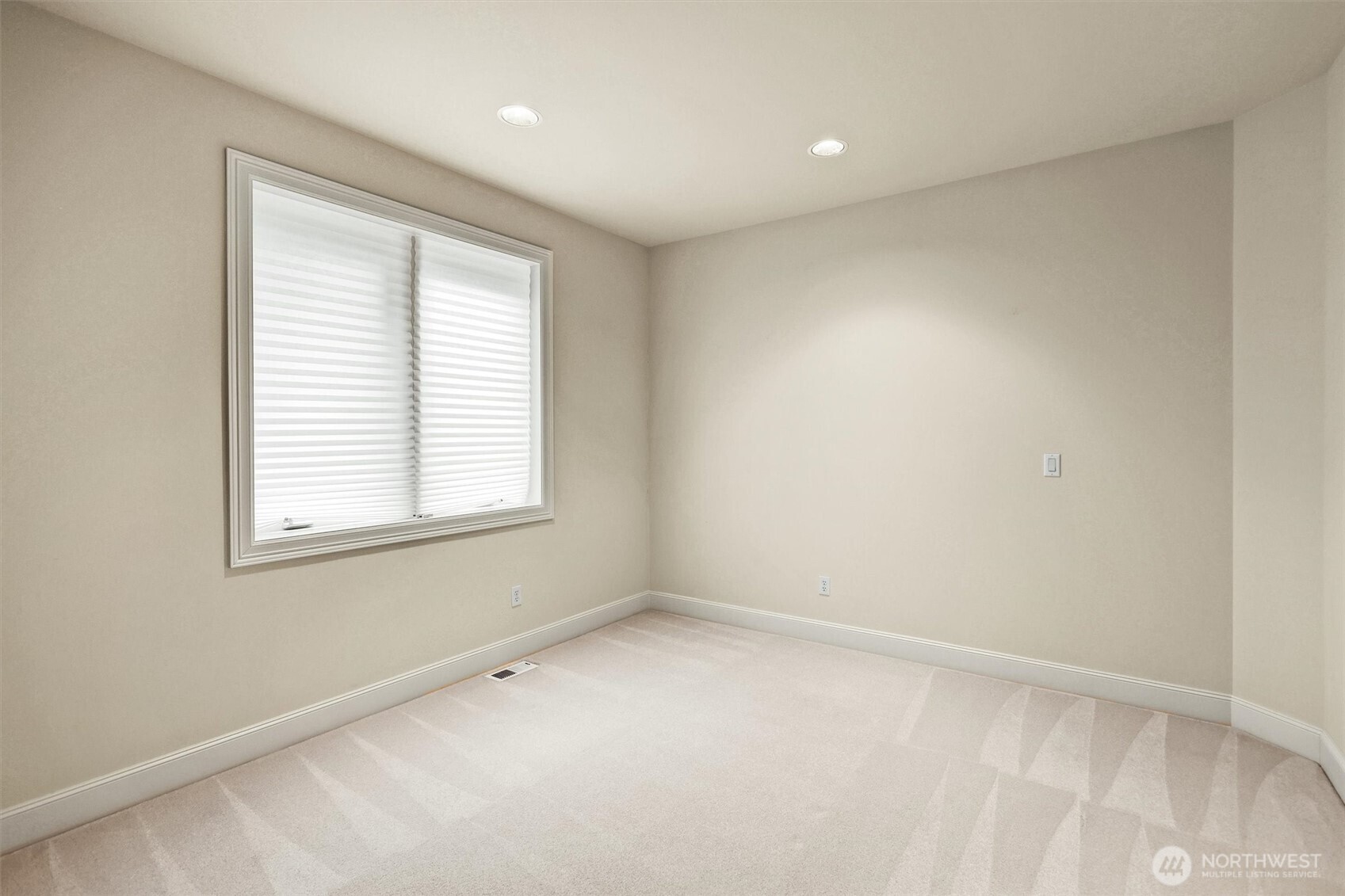 Spacious main floor bedroom.
