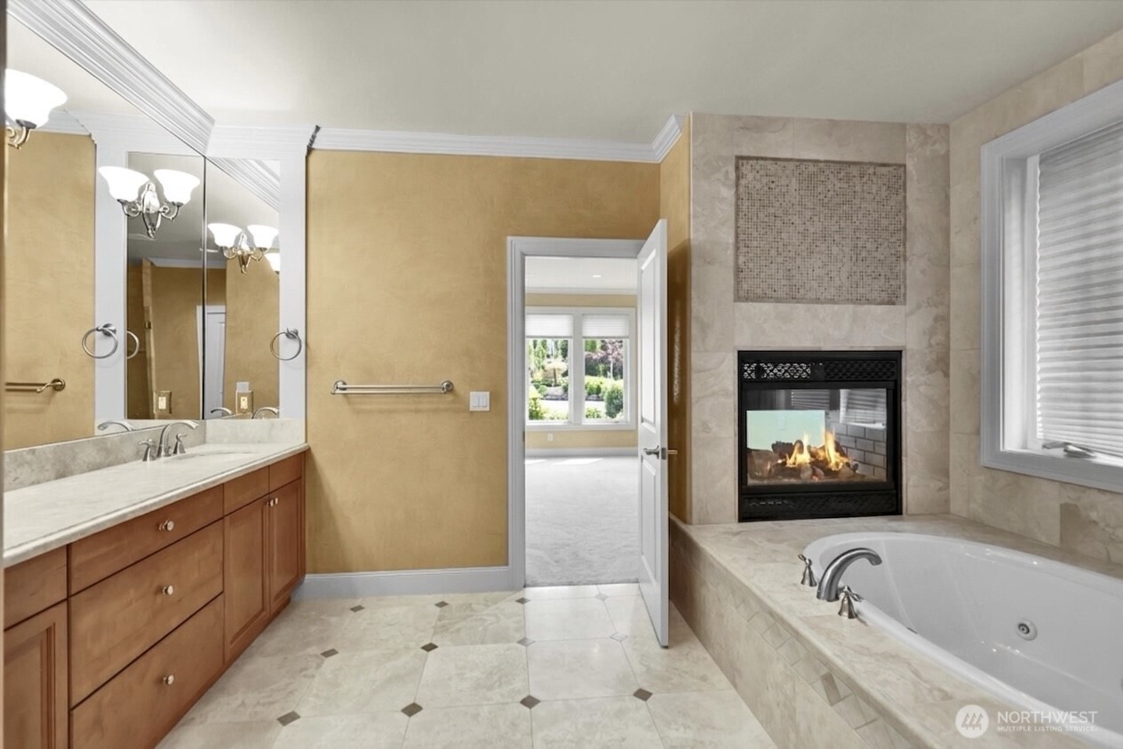 Primary bathroom featuring a tranquil, resort-like ambiance.