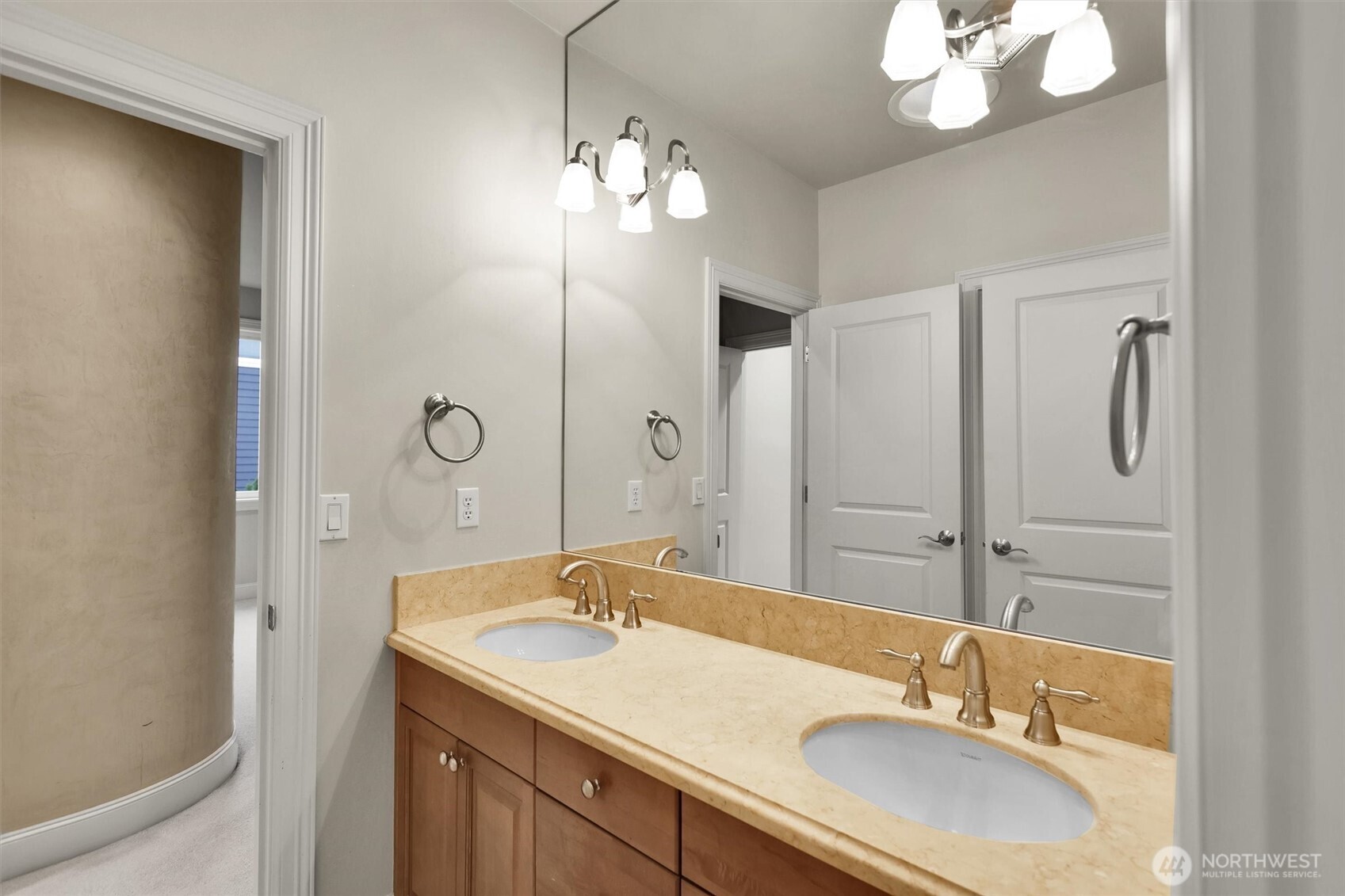 Part of a convenient Jack-and-Jill bathroom shared between bedrooms.