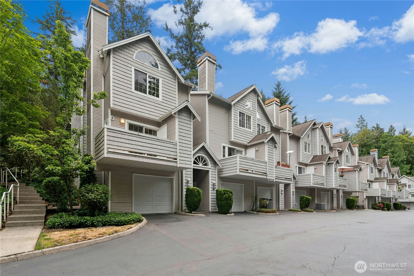 End-unit location with convenient access and two dedicated parking spaces.