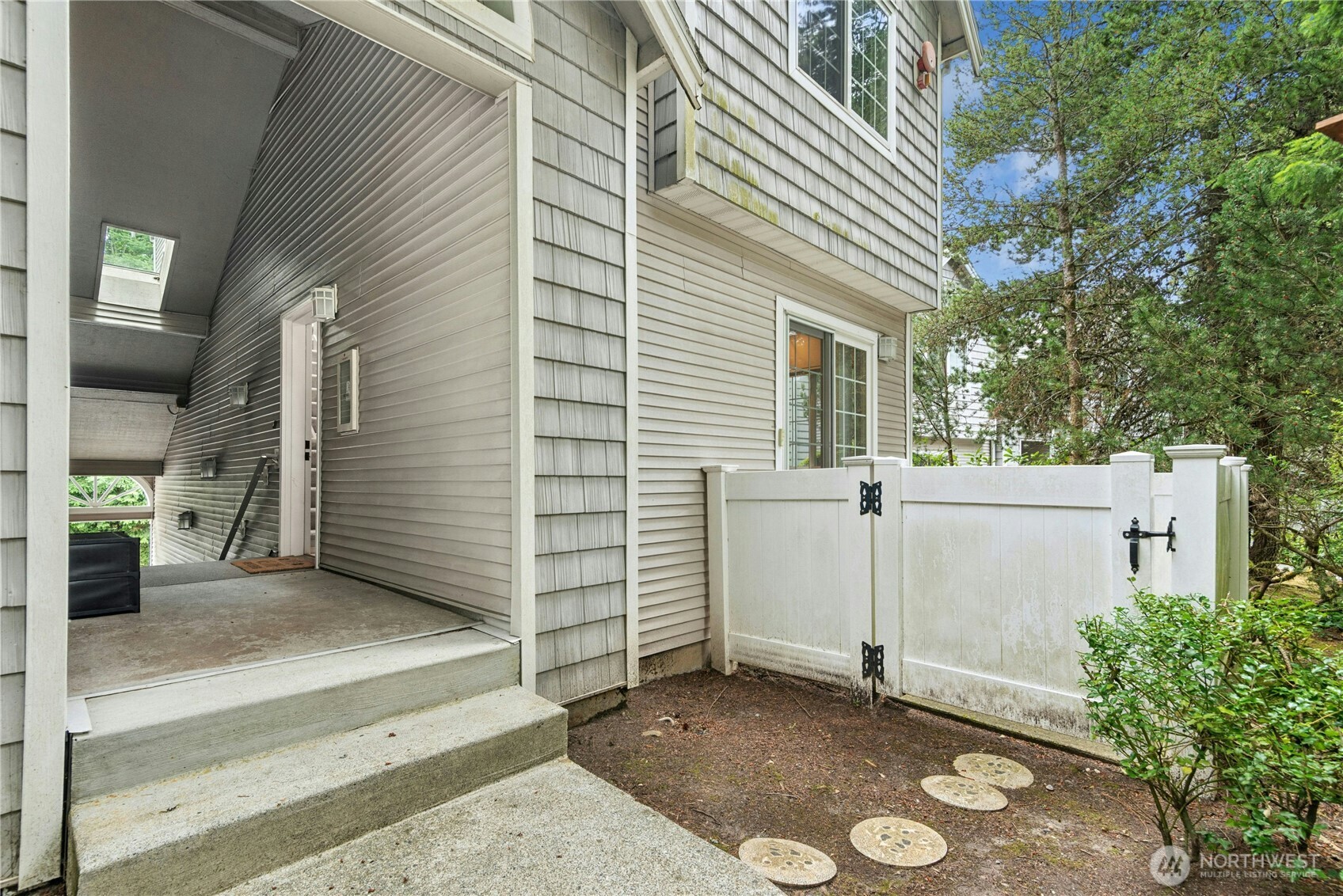 Private rear deck with direct access to the breakfast nook, creating a seamless connection between indoor and outdoor living.