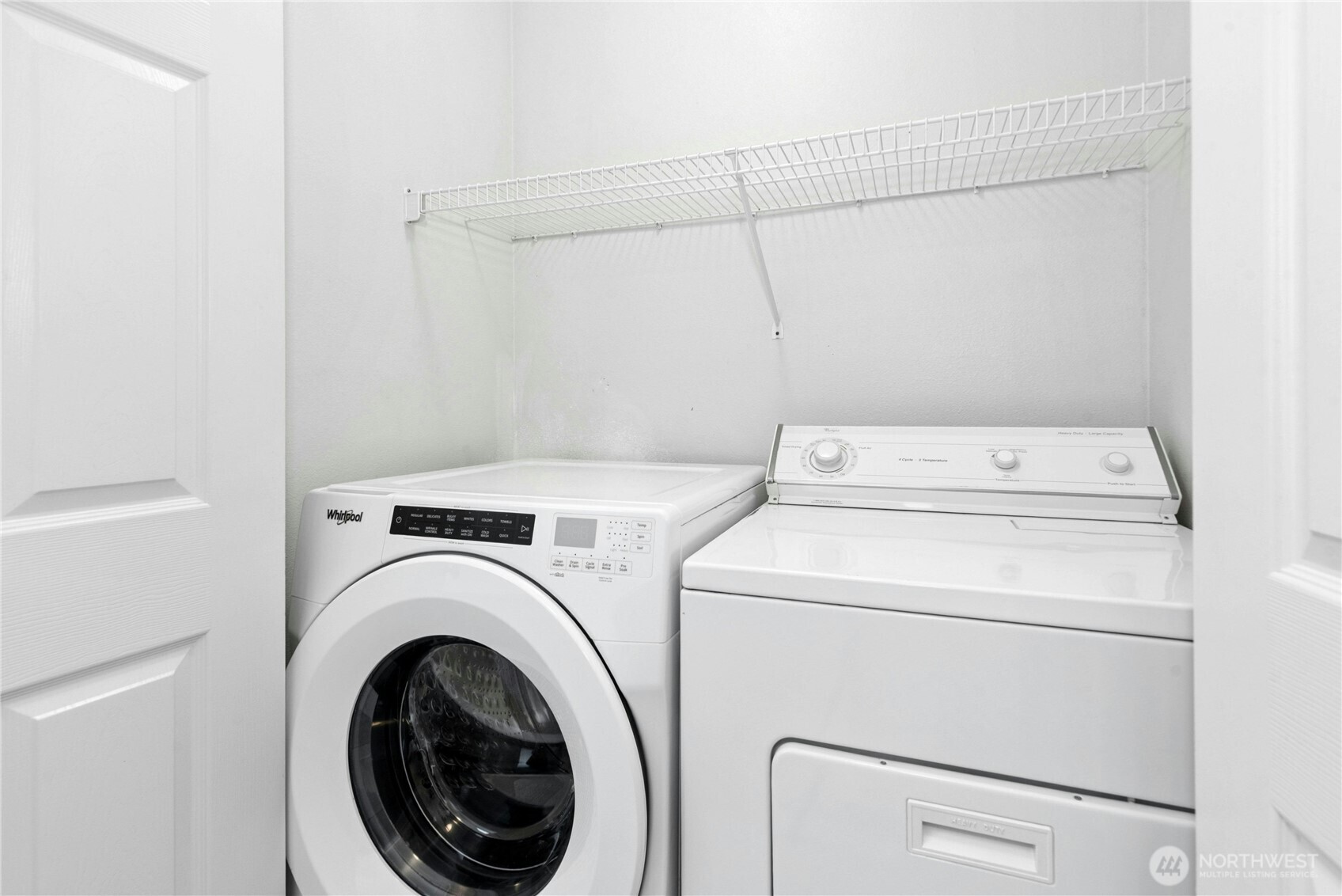 Convenient upstairs laundry with washer and dryer included.