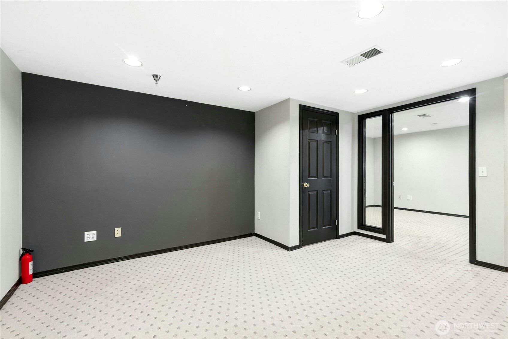 Finished lower-level flex space with private exterior entrance, offering over 400 square feet of additional finished space not included in the reported living area.