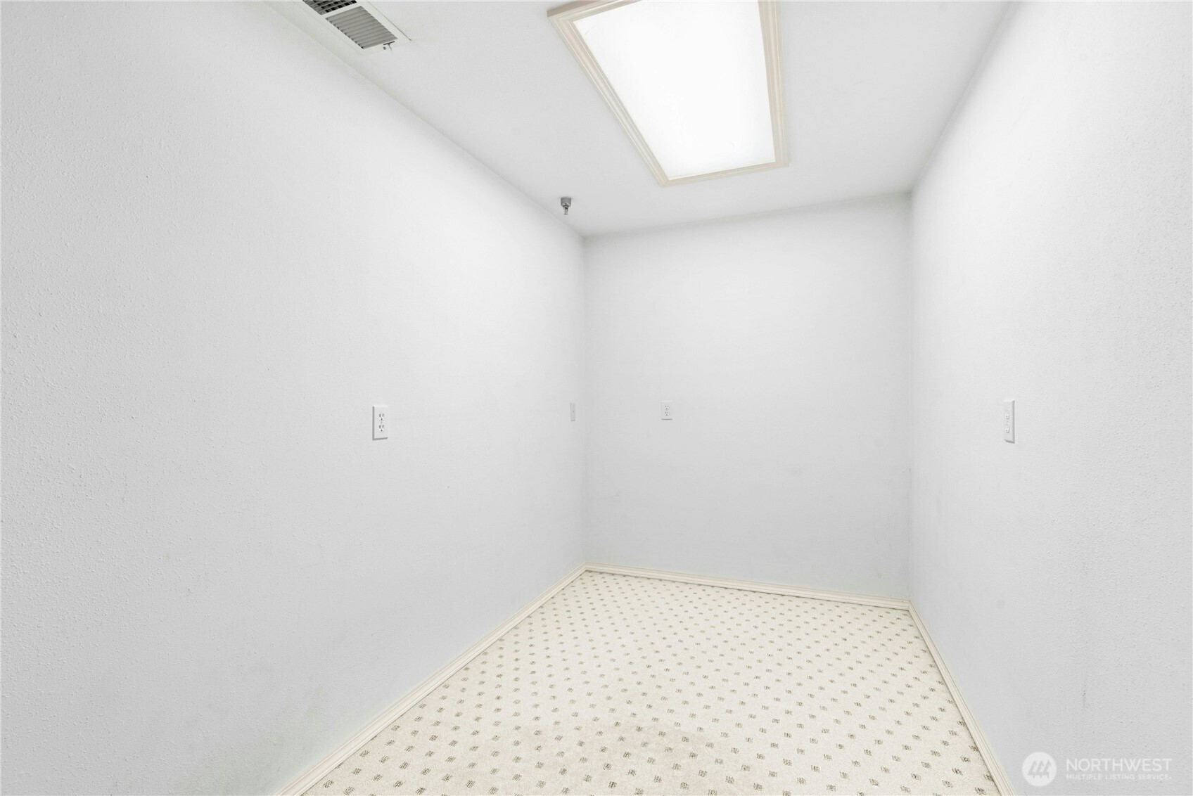 Dedicated storage room within the finished lower-level flex space.