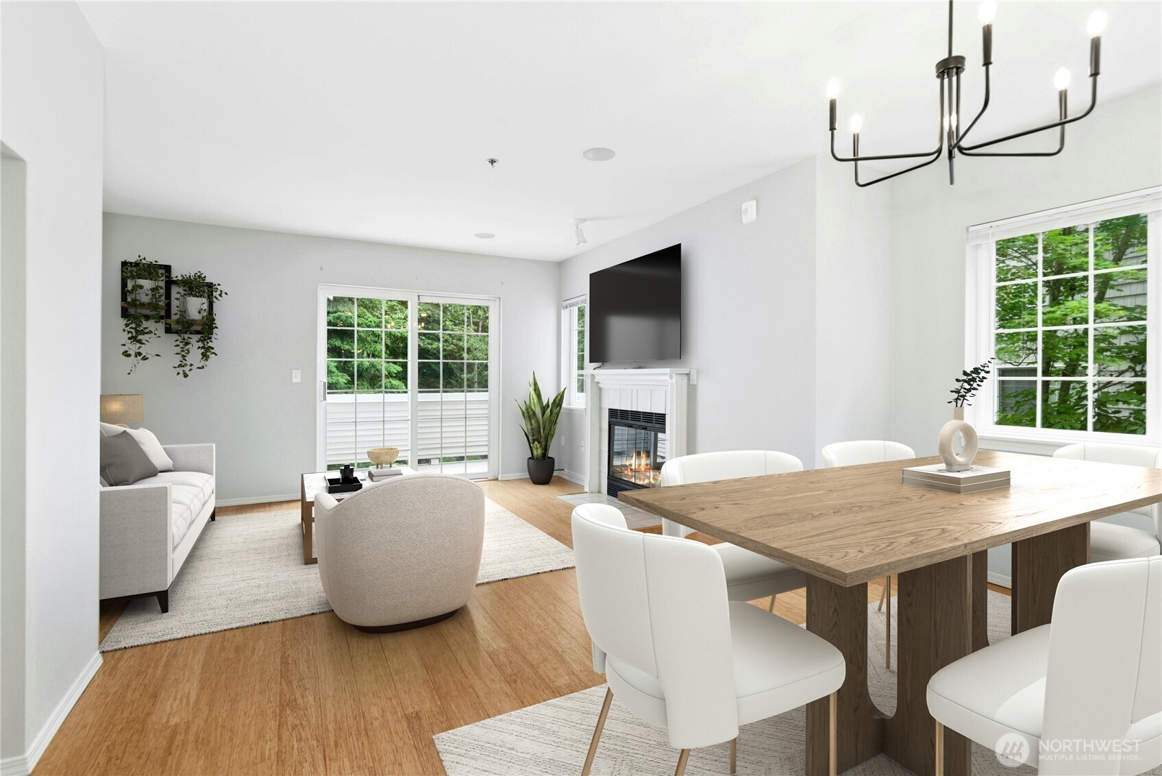 Virtually Staged - Dining area opens to the kitchen and living room, creating a functional layout for gathering with family and friends.