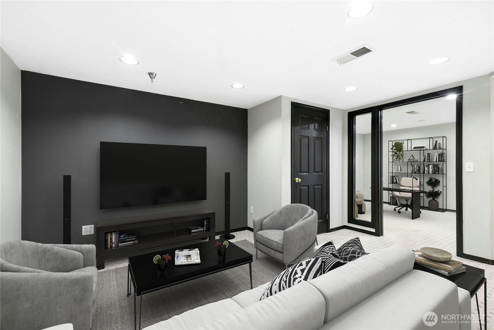 Virtually Staged - Finished lower-level flex space shown as a media room. Over 400 sq ft of additional finished space not included in the reported living area.