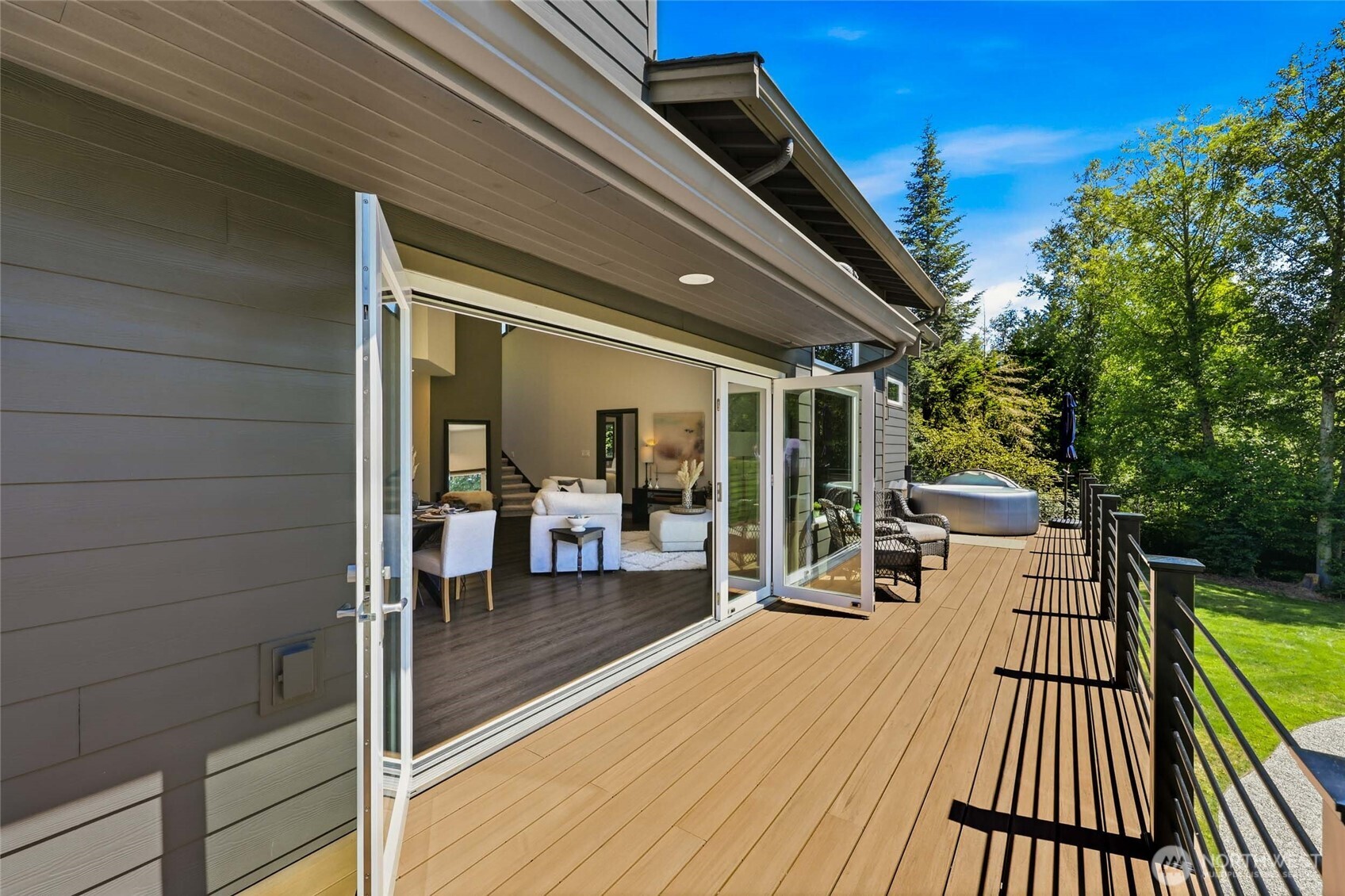 Accordion-style glass doors for seamless indoor/outdoor living