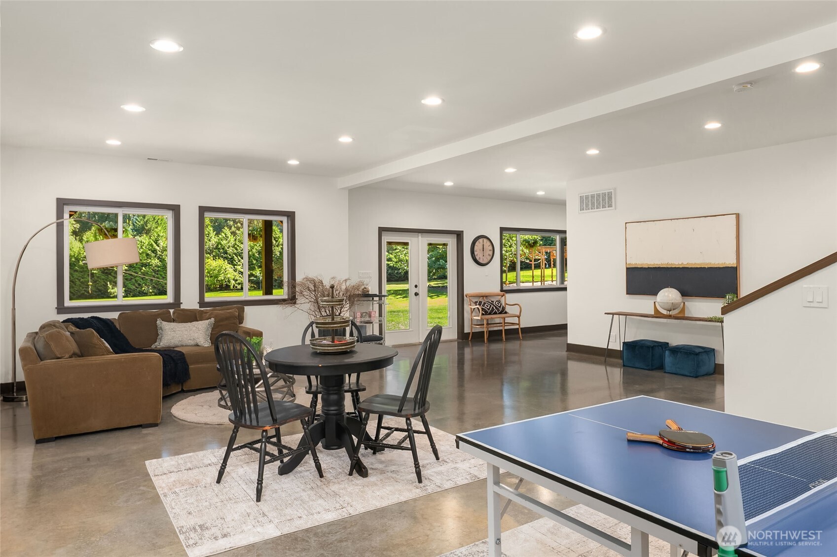 Sealed concrete floors for easy indoor/outdoor living with two electrical outlets in the floor ready for any layout.