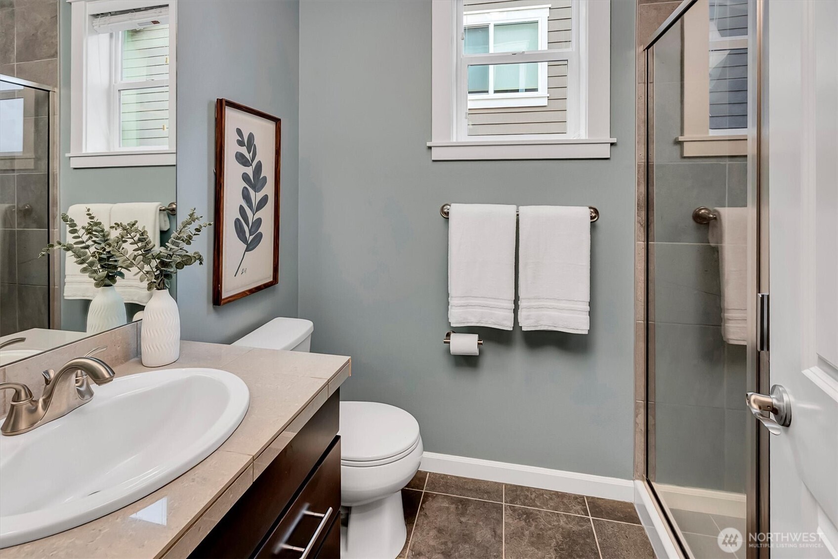 Main level bedroom with adjacent full bath