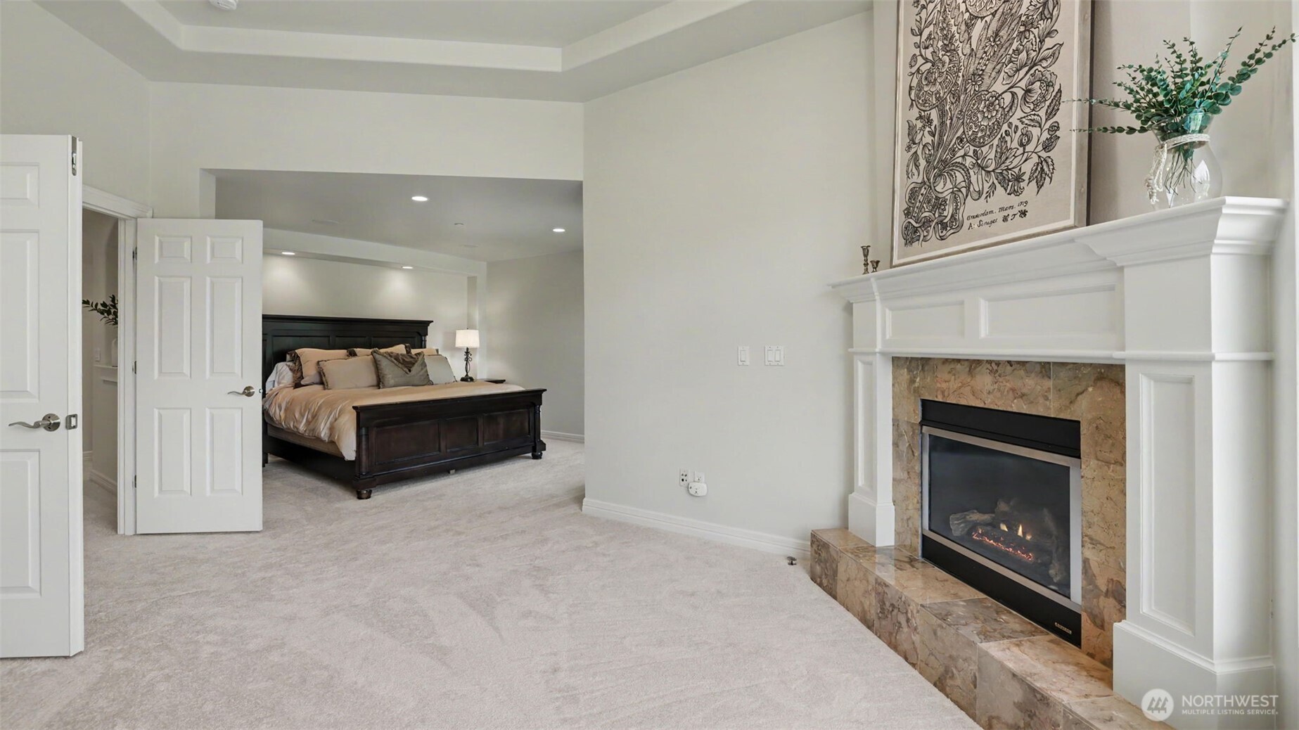 Primary Bedroom with sitting room/gas fireplace.