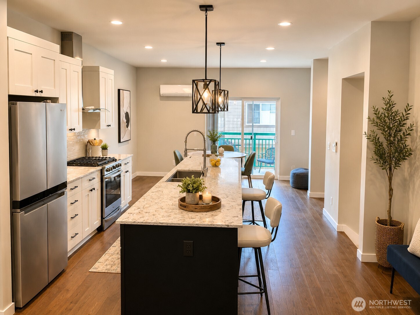 Gourmet kitchen with stainless steel upgraded appliances! Check out the X-large Island with quartz counters!  Perfect place to entertain!