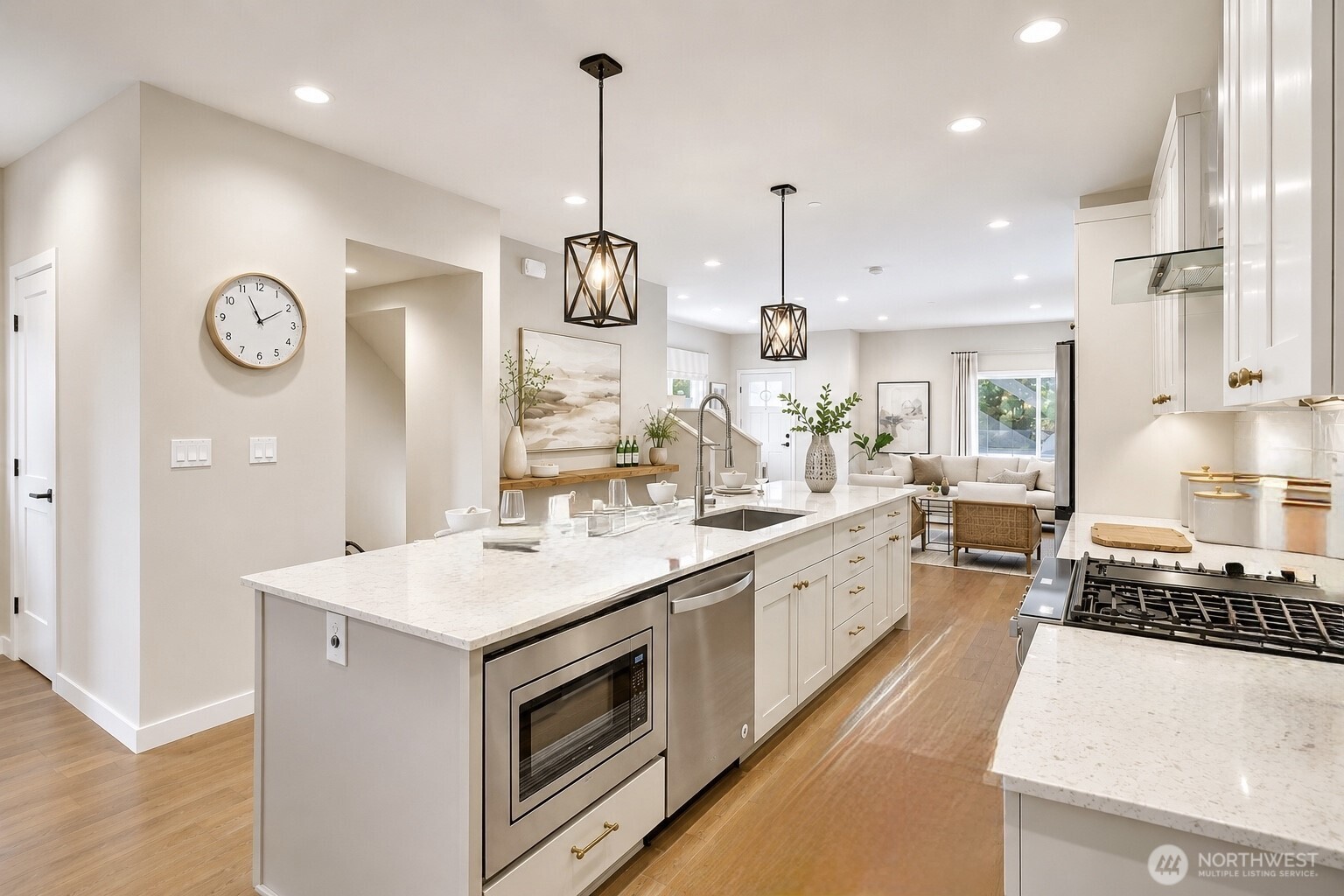 Second angle of the kitchen with dining area leading to the covered patio perfect for morning coffee!